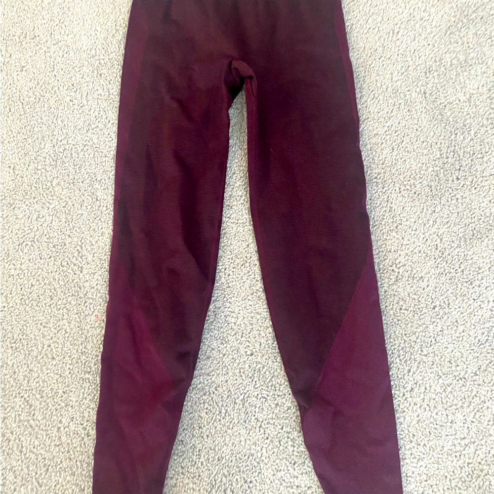 Pink brand leggings. Burgundy color size small.